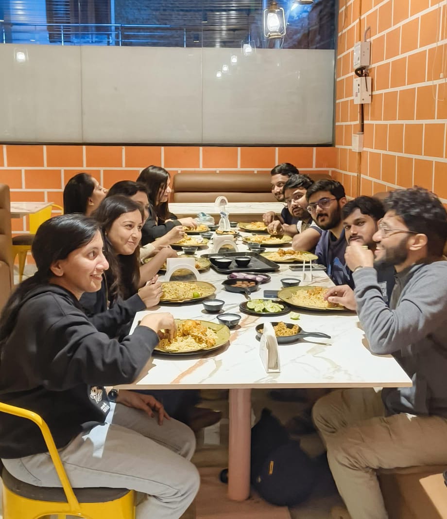 Close-up of a delicious biryani dish being served at a celebration.